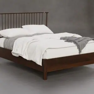 Solid wood bed with a slatted headboard in a rich finish.